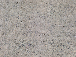 Rough gray cement surface. Anthracite porous pavement texture. Abstract background. Grunge texture.