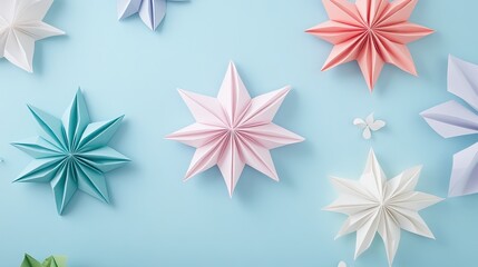 Vibrant paper stars in pastel colors against a blue background, perfect for festive decorations and creative projects.