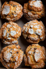Close of chocolate chip muffins in a box