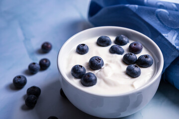 Creamy Greek yogurt and blueberries in a bowl