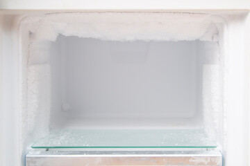The freezer is frozen.Cleaning the freezer from ice.