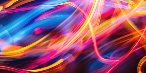 Obraz premium Vibrant Abstract Light Streaks in Red, Blue, Yellow, and Purple on Dark Background. AI generated illustration