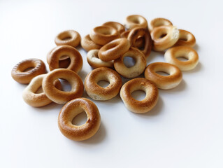 Dried small bagels on a white background