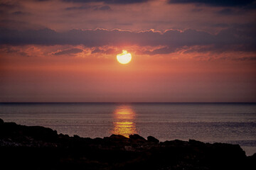 Vintage photograph of a sunset over the sea