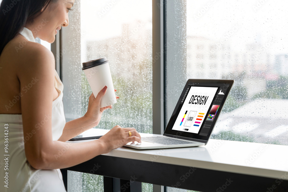 Poster graphic designer software for modern design of web page and commercial ads showing on the computer s