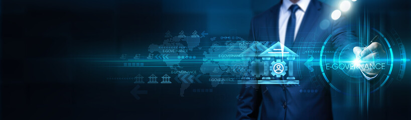 Businessman touches e-governance system structure, global network. Digital transformation enables...