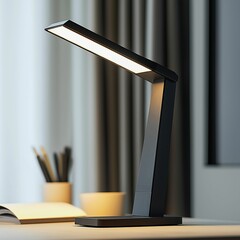 Modern black desk lamp with an LED light strip, angular design, and touch-sensitive lights, creating ambient lighting for work.