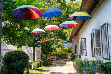 2024.08.30 Szigliget, Hungary: beautiful rustic old town of Szigliget with colorful umbrella decoration