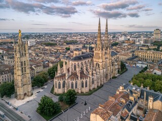  The drone aerial view of Bordeaux Cathedral and Pey Berland Tower at sunrise, Bordeaux, France.