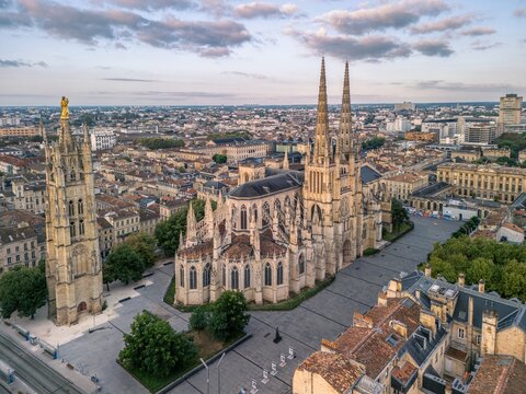  The drone aerial view of Bordeaux Cathedral and Pey Berland Tower at sunrise, Bordeaux, France.