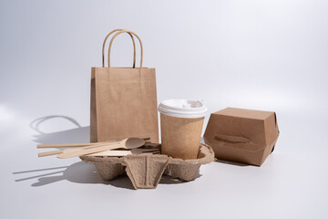 Paper cup and craft bag. A glass for coffee and hot drinks to take with you. Food delivery service....
