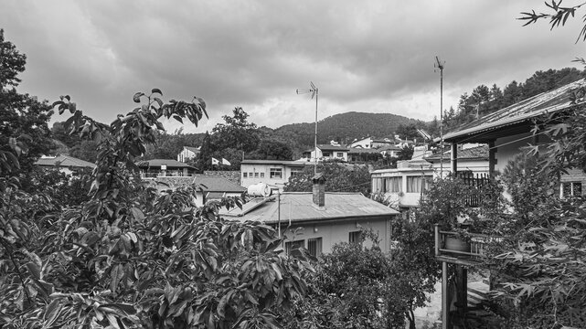 Street and house view of Phini (Foini), a picturesque, natural beauty mountainous village, of natural beauty, in the Troodos Mountains, located near by the town of Platres, Limassol district, Cyprus