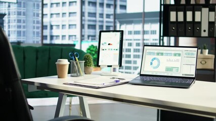 Empty luxurious corporate high end office designed for a CEO or leader, running analytics and data driven insights on screen. Urban global enterprise, business empowerment. Camera A.