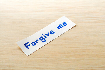 Handwritten note on with the words 