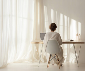 Woman Sitting in Sunlit Room with Desk