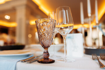 Photo of empty glasses in restaurant.