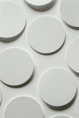 A close-up view of many small white circles on a white background, possibly representing something abstract or futuristic