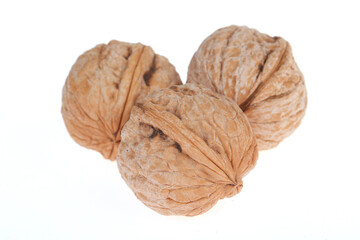 Walnuts are isolated on a white background,