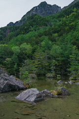 日本　長野県松本市安曇にある山岳景勝地の上高地　穂高神社奥宮神域の明神池の二之池