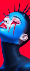 A striking artistic portrait of a person with blue face paint, dramatic red makeup, and black spikes on a vibrant red background.