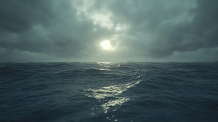 The ocean reveals its dark and moody depths as turbulent waves reflect a faint light breaking through heavy clouds