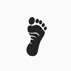 Black silhouette of a human footprint against a white background.