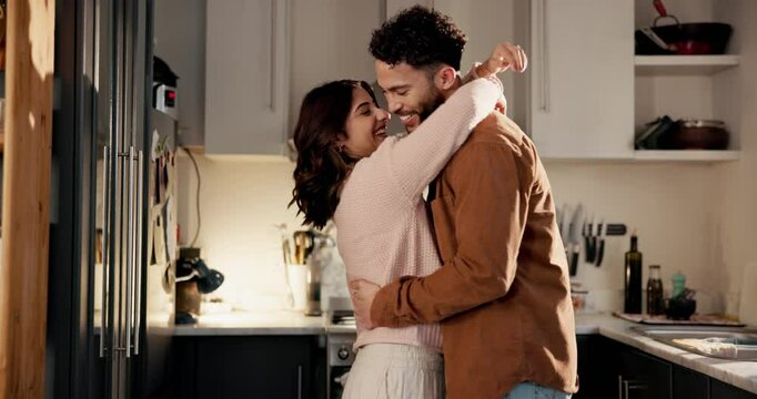 Dance, funny and pregnant with couple in kitchen of home together for celebration or family planning. Laughing, love or smile with happy man and woman in apartment for bonding or pregnancy success