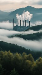 Fototapeta premium Industrial plant in a foggy mountain forest