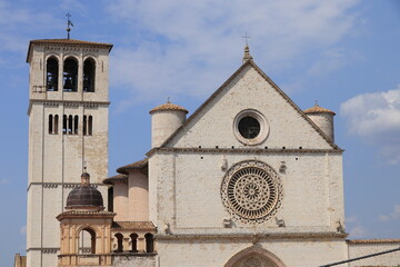 San Francesco di Assisi Basilica Facade with Church Tower in Umbria, Italy