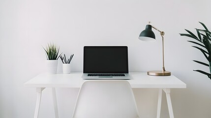 Fototapeta premium A minimalist workspace with a clean desk, a laptop, and a simple chair