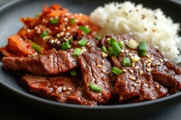Thin slices of Korean BBQ beef, grilled and served with kimchi and rice