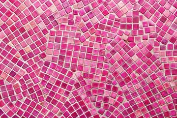 Abstract pink mosaic tile pattern with varying shades of pink and red in intricate design