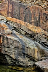 Boulder Wall by a River 