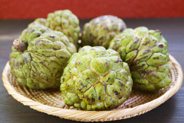 Heap of Ripe Organic Sugar Apples (Annona Squamosa) Whole Fruits in a Basket