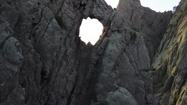 Trou de la Bombe, Massiv dde Bavella, Corse, France at sunrise, view from drone
