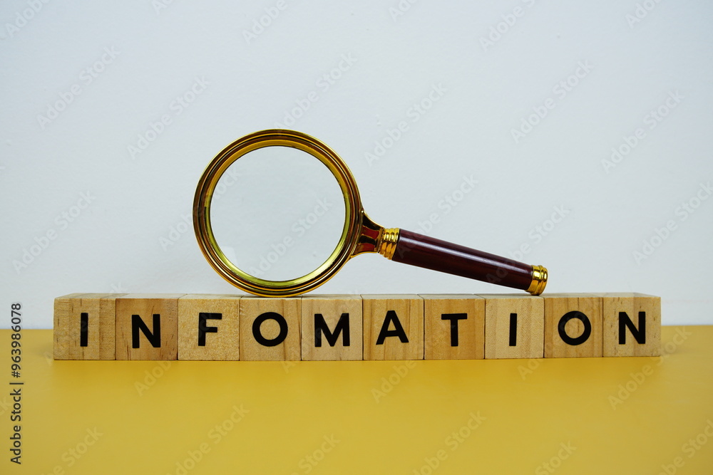 Poster magnifying glass with wooden blocks alphabet letters infomation text message on yellow background