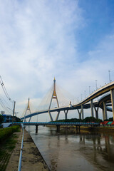 Modern Bhumibol bridge curve road with blue sky in Bangkok