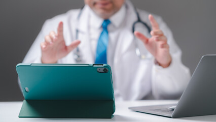 A healthcare professional engages in a virtual consultation, using modern technology to enhance patient communication and care The rise of telemedicine transforms the way healthcare is delivered