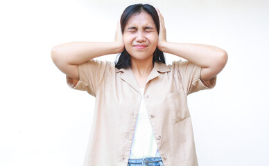 confused asian woman hold her head feels stressed and overwhelmed wearing casual clothes isolated on white background