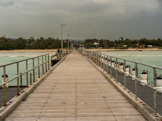 Obraz premium View Down Rosebud Pier Showing Bollards