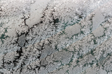 Close-Up View of Beautiful Ice Crystals on a Window Pane During the Winter Season