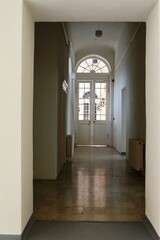 the white entrance door to the museum