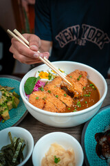 Photograph of Japanese food on a restaurant table in Japan.