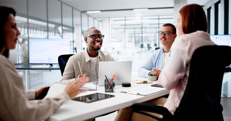 Group Of Multi Ethnic Businesspeople Discussing Together