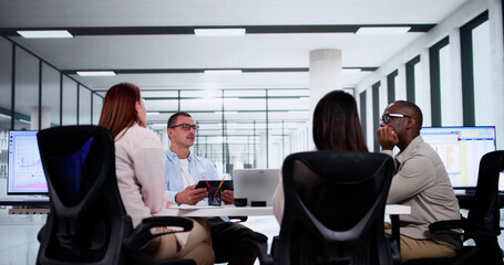 Company Inside Meeting In Office Boardroom