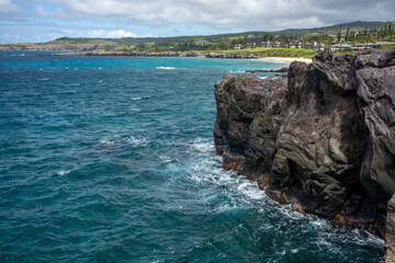 Rugged coastline at the tip of Makaluapuna Point in West Maui, Hawaii - Lava cliffs of Dragon's Point on the Kapalua Coastal Trail