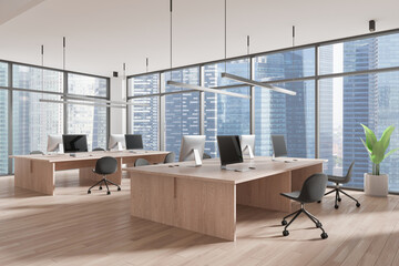 Modern open-plan office interior with large windows and cityscape backdrop. 3D Rendering