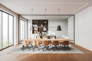 Stylish office interior with wooden table and chairs, workplace and window