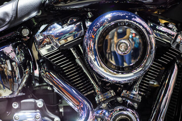 Shiny chrome motorcycle engine with twin piston