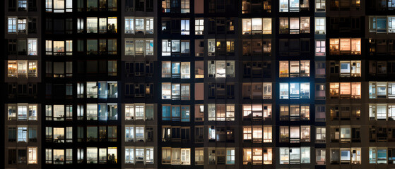 City Lights: Apartment Building Windows at Night